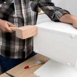 man-creating-cabinet-from-wood-2.webp