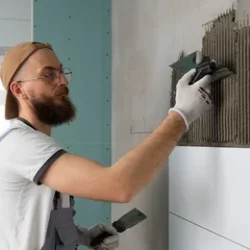 tiler-working-renovation-apartment-2.webp